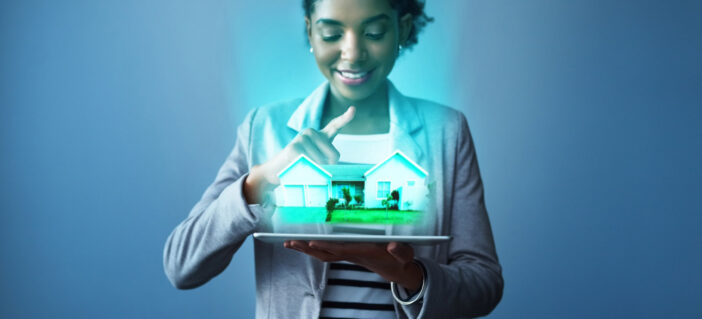 Business Woman holding a digital house_ Digital Transformation in Real Estate